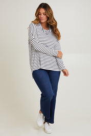 Model Laura wearing size 14 of the Cowl Bamboo Top in colour Monostripe (White), from the front, showing the whole outfit