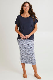 Model Madeline wearing size 10 of the Fallon Bamboo Top in colour Petrol (Blue), from the front, showing the whole outfit