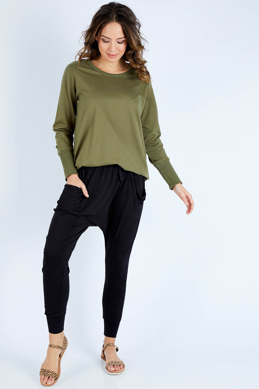 Model Gemma wearing size 10 of the Barcelona Pant in colour Black (Black), from the front, showing the whole outfit