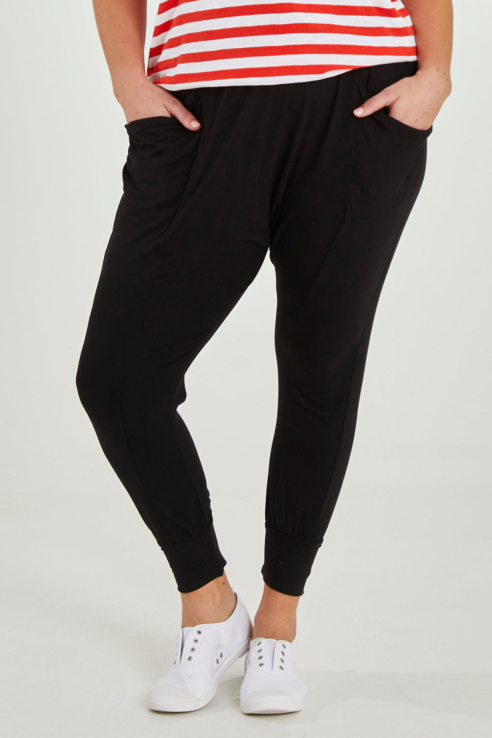 Model Maddy wearing size 16 of the Barcelona Pant in colour Black (Black), from the front, cropped image
