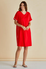 A model wearing the Stellar Cotton Tin colourShirt Dress - Red (Red), from the front, showing the whole outfit