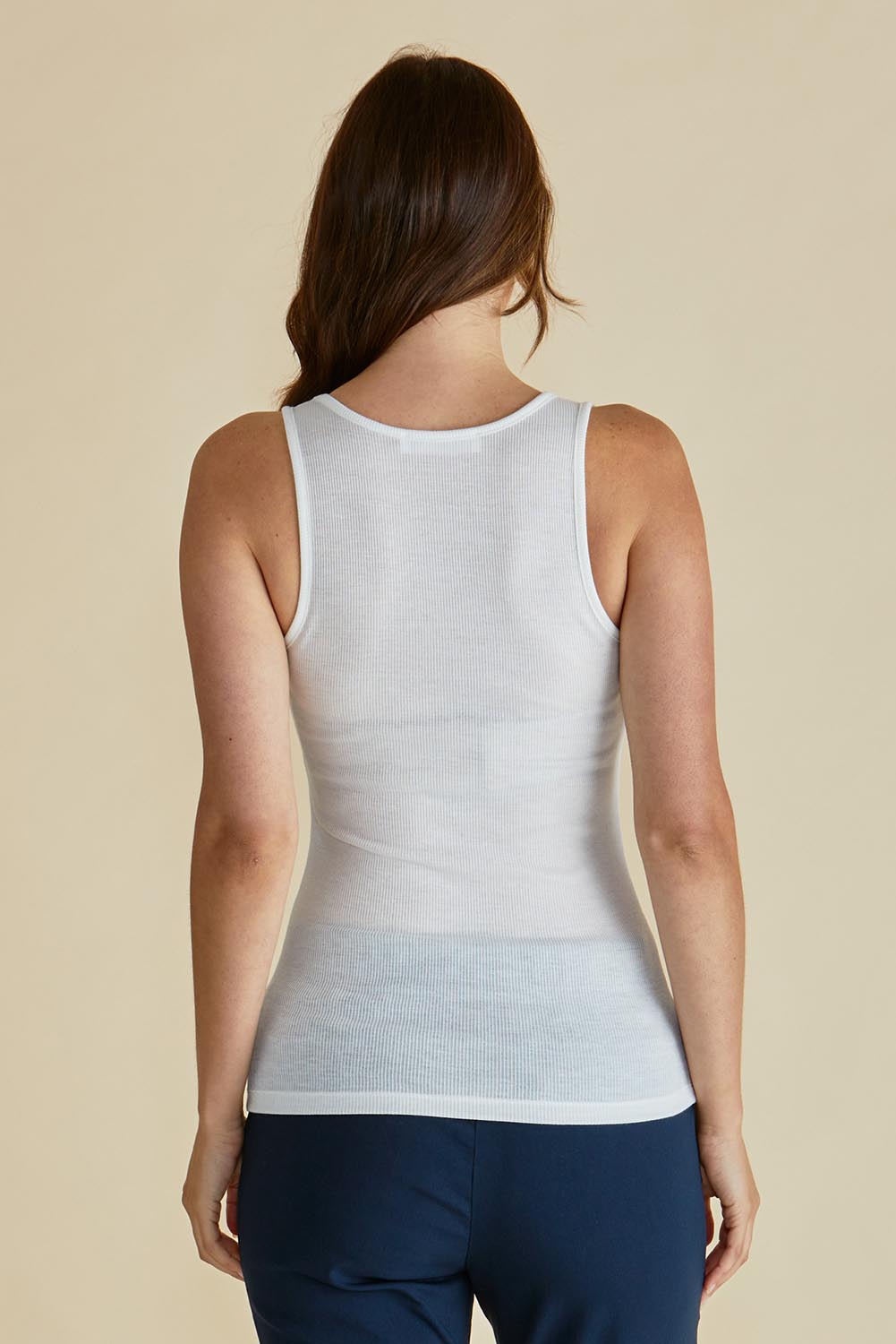 A model wearing the Tiana Cotton Blend Tank in colour White (White), from the back
