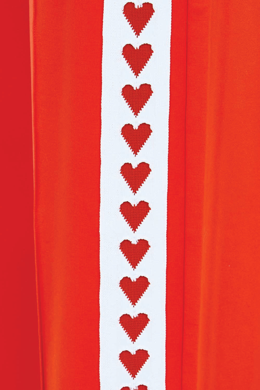 Product shot of the Jamie Track Pant – Tomato in colour Tomato, showing detail