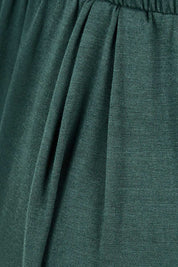Product shot of the Paris Pant in colour Ivy (Green), detail