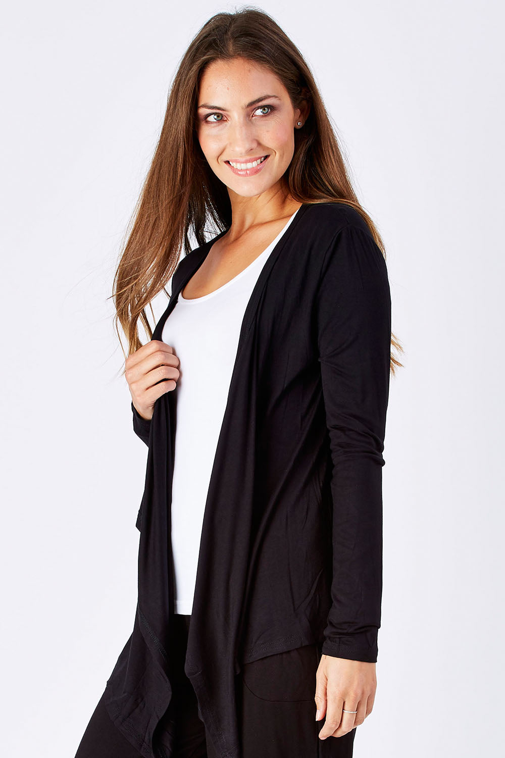 Model Anna wearing size 10 of the Melbourne Stretch Cardigan in colour Black (Black), from the front, cropped image