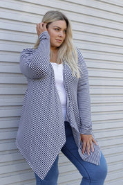 A model wearing the Melbourne Stretch Cardigan in colour NavyWhtStr (Blue), from the front, showing the whole outfit