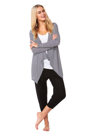 A model wearing the Melbourne Stretch Cardigan in colour NavyWhtStr (Blue), from the front, showing the whole outfit
