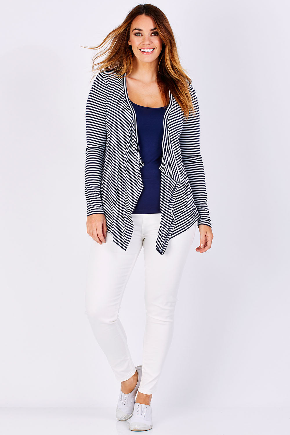 Model Laura wearing size 12 of the Melbourne Stretch Cardigan in colour NavyWhtStr (Blue), from the front, showing the whole outfit