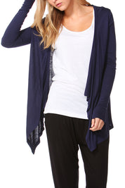 A model wearing the Melbourne Stretch Cardigan in colour Navy (Blue), from the front, cropped image