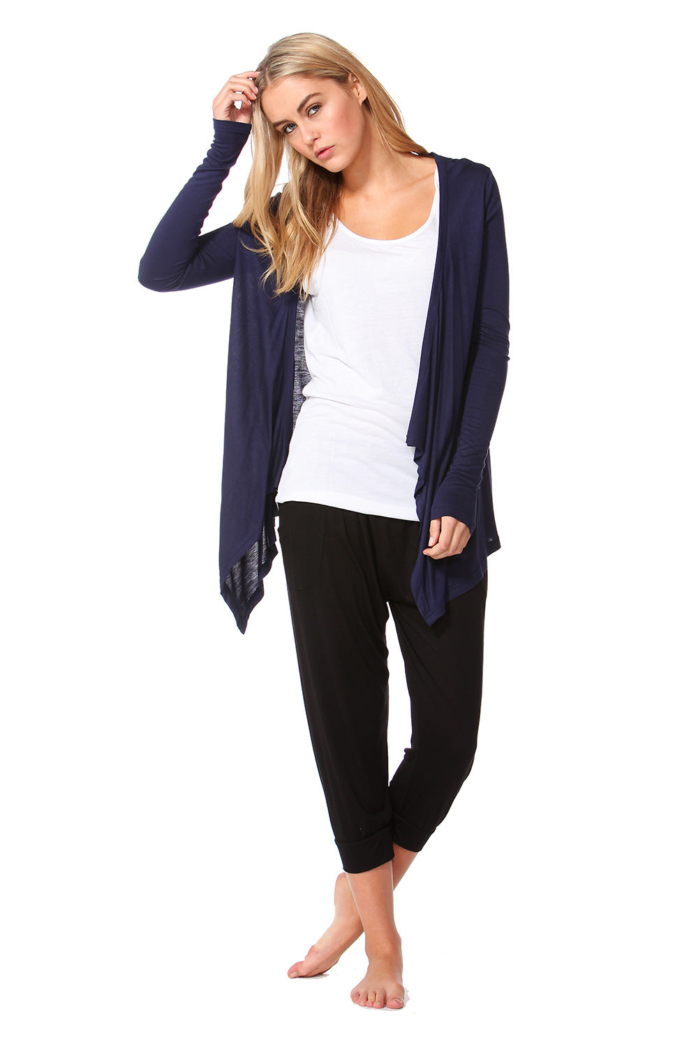 A model wearing the Melbourne Stretch Cardigan in colour Navy (Blue), from the front, showing the whole outfit