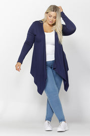 A model wearing the Melbourne Stretch Cardigan in colour Navy (Blue), from the front, showing the whole outfit