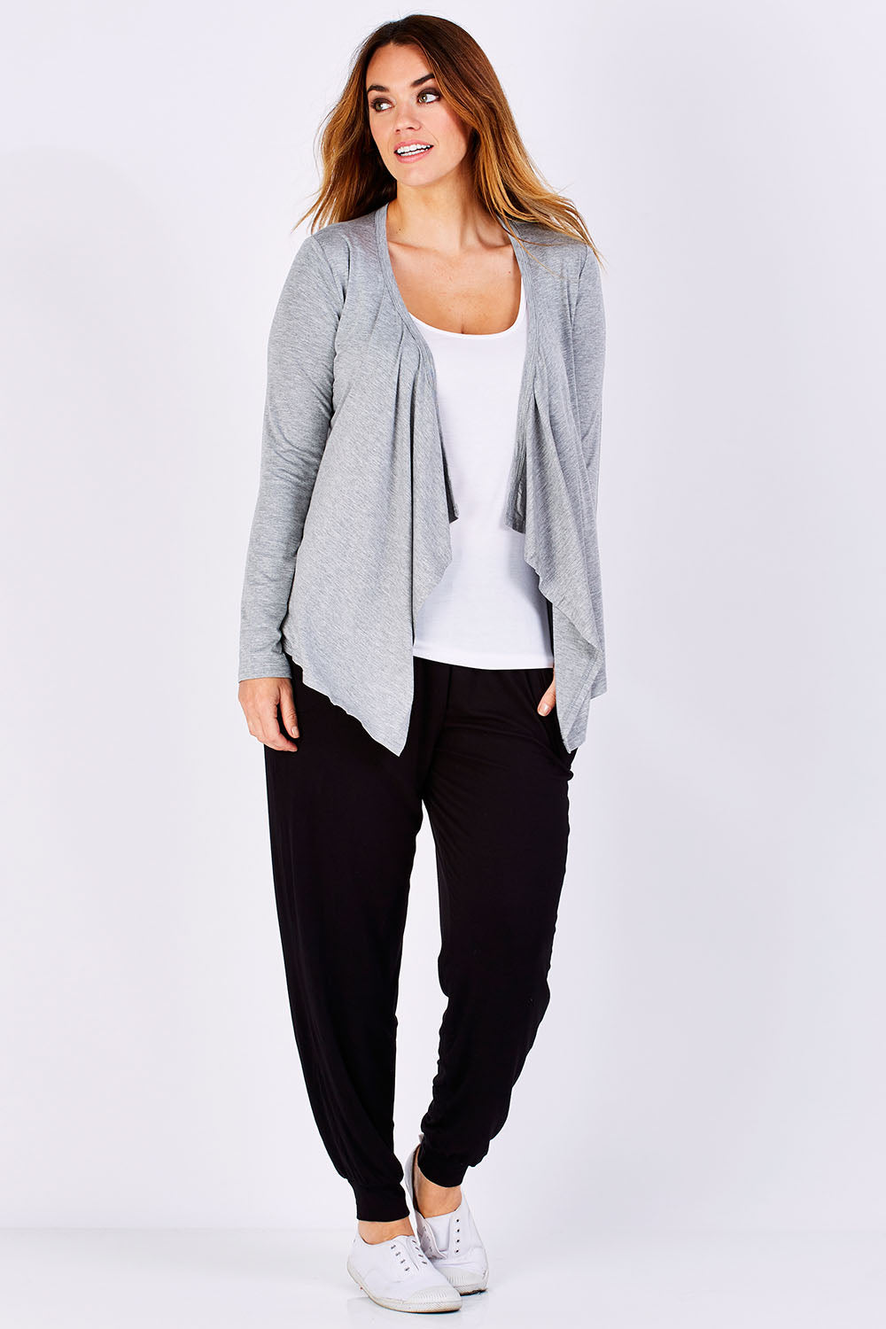 Model Laura wearing size 12 of the Melbourne Stretch Cardigan in colour SilverMarl (Grey), from the front, showing the whole outfit
