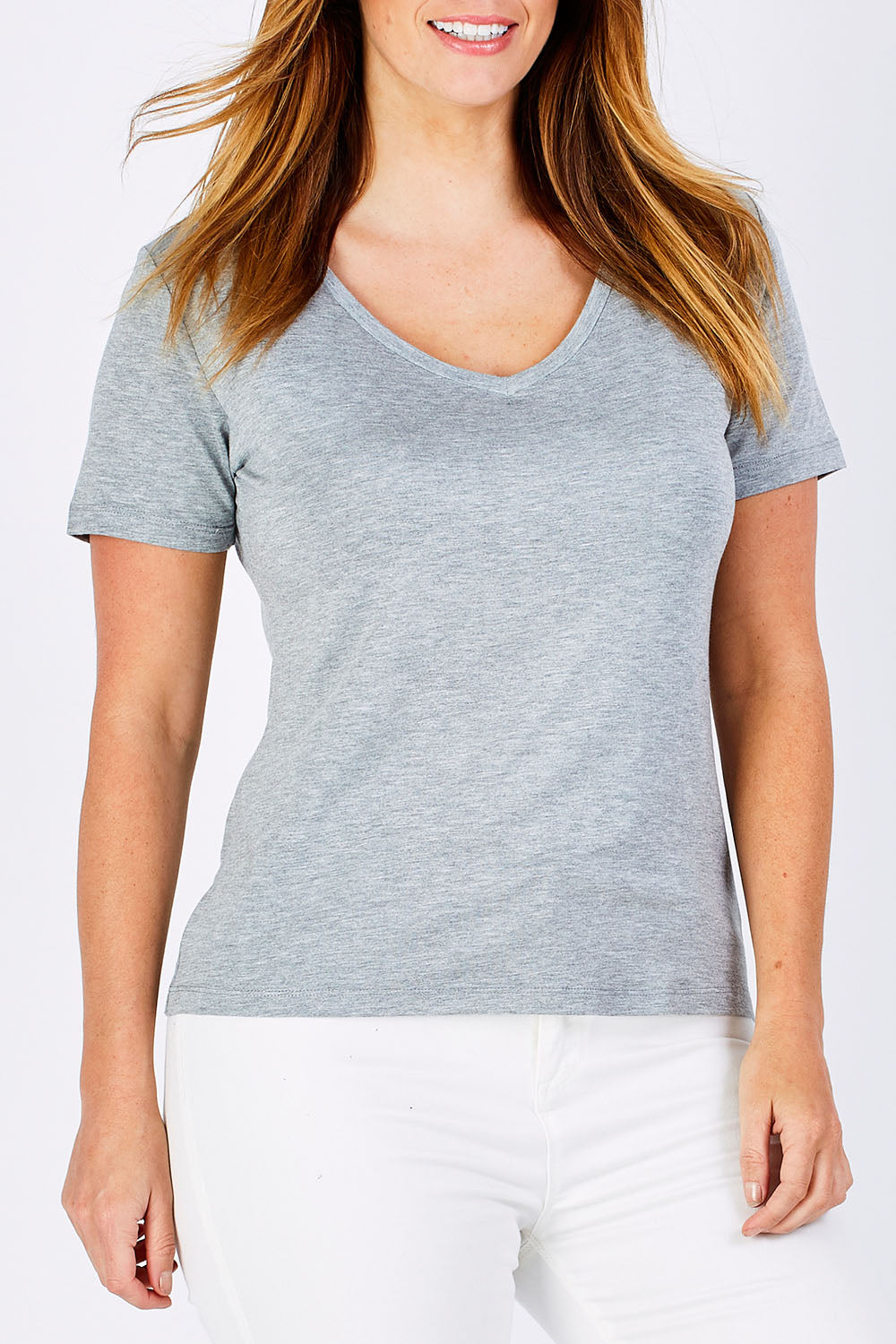 Model Laura wearing size 12 of the Manhattan Stretch Tee in colour SilverMarl (Grey), from the front, cropped image