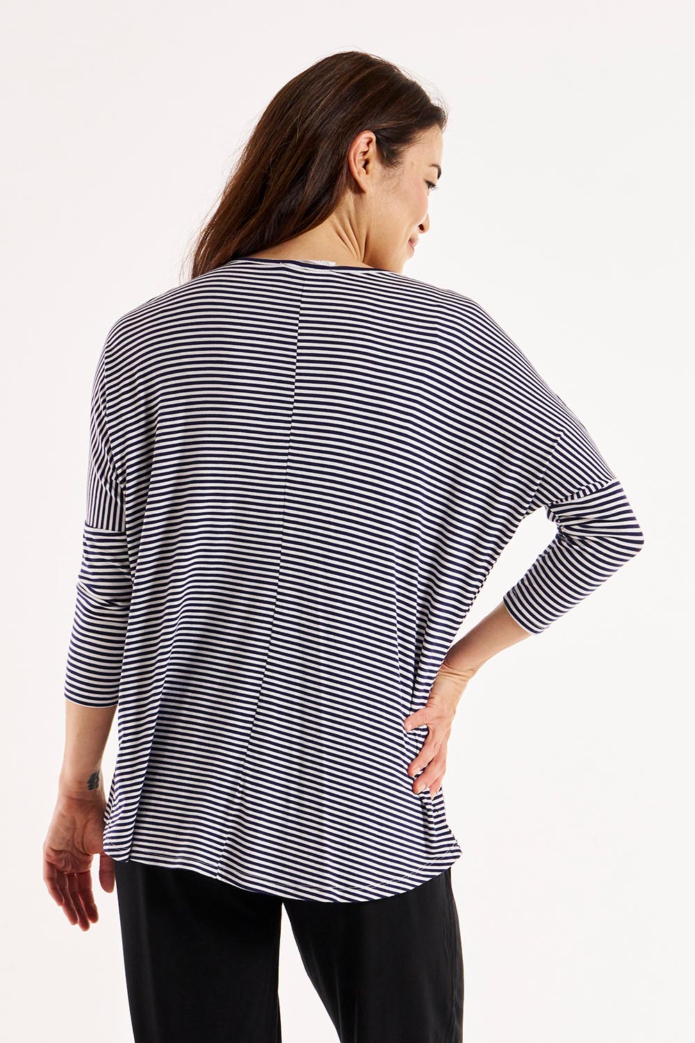 A model wearing the Milan 3/4 Sleeve Top in colour Nutmegstr, from the back