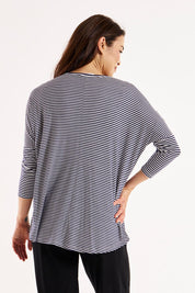 A model wearing the Milan 3/4 Sleeve Top in colour Nutmegstr, from the back