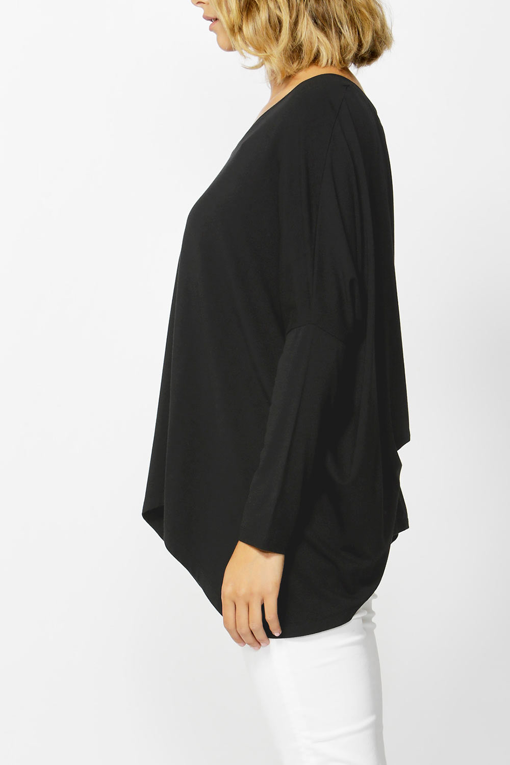 A model wearing the Geneva Vin colourNeck Top - Black (Black), from the front, cropped image