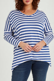Model Maddy wearing size 16 of the Geneva Tee in colour Whitestrip (White), from the front, cropped image