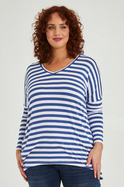Model Maddy wearing size 16 of the Geneva Tee in colour Whitestrip (White), from the front, cropped image