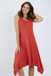 Model Madeline wearing size 10 of the Madrid Dress in colour Sunset, from the front, cropped image