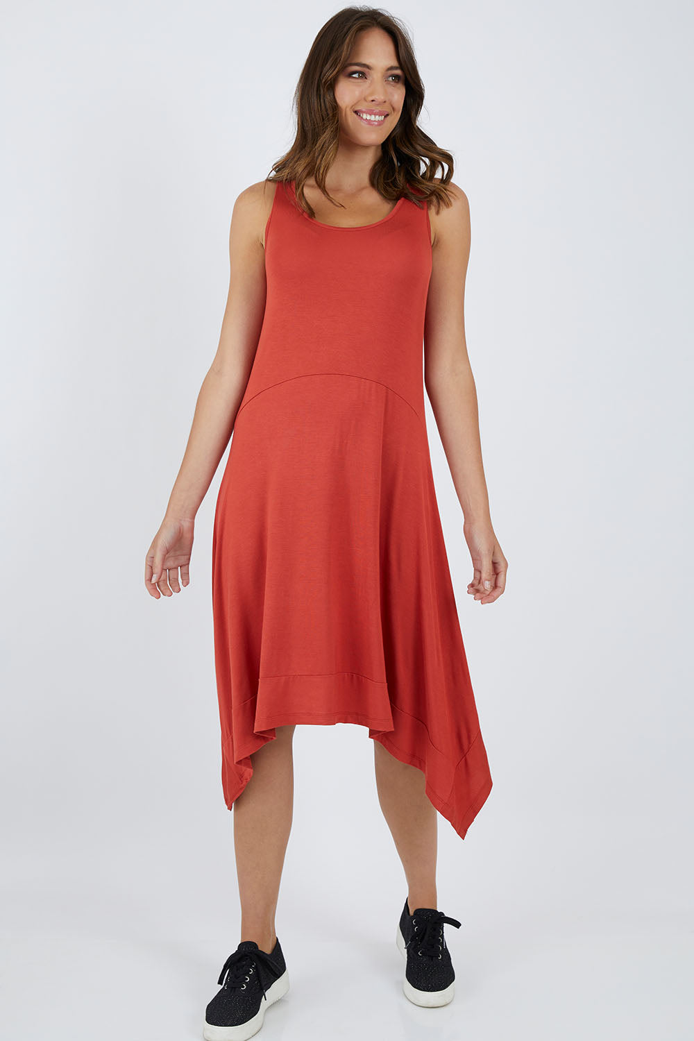 Model Madeline wearing size 10 of the Madrid Dress in colour Sunset, from the front, showing the whole outfit
