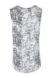 Product shot of the Capri Tank in colour Spotty (White), from the back