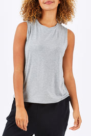 Model Summer wearing size 10 of the Capri Tank in colour SilverMarl (Grey), from the front, cropped image