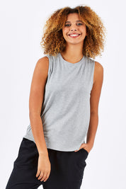 Model Summer wearing size 10 of the Capri Tank in colour SilverMarl (Grey), from the front, cropped image