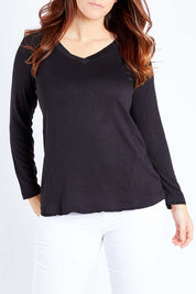 Model Laura wearing size 12 of the York Top in colour Black (Black), from the front, cropped image