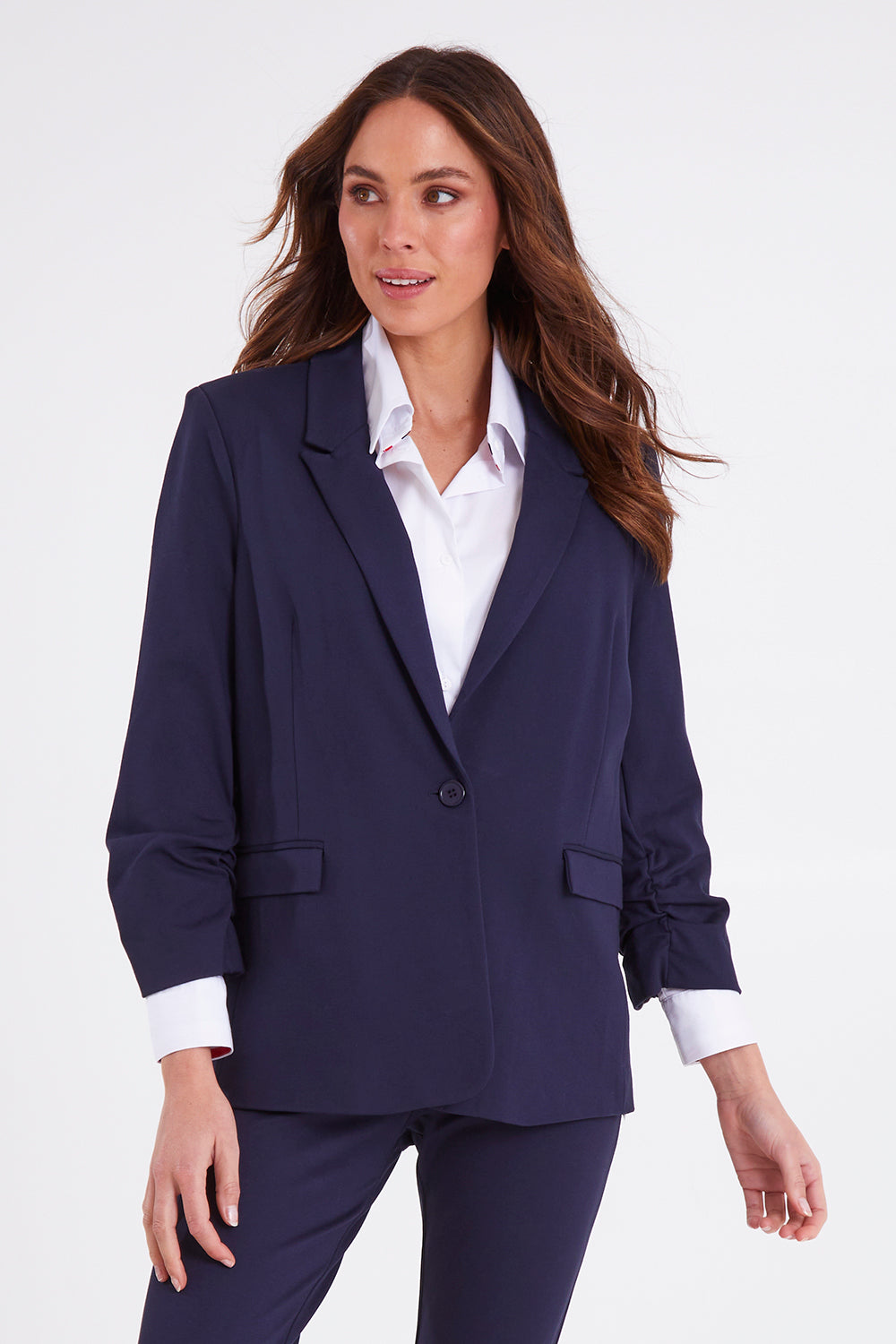 Model Madeline wearing size 10 of the Merci Ponte Blazer in colour Peonynavy (Blue), from the front, cropped image