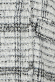 Product shot of the Wanda Coat in colour Monochrome (Grey), detail