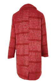 Product shot of the Wanda Coat in colour Rouge (Red), from the back