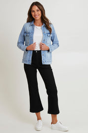 Model Madeline wearing size 10 of the Mayfair Denim Jacket in colour Vintage (Blue), from the front, showing the whole outfit