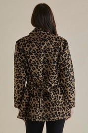 A model wearing the Prague Coat in colour Animal, from the back