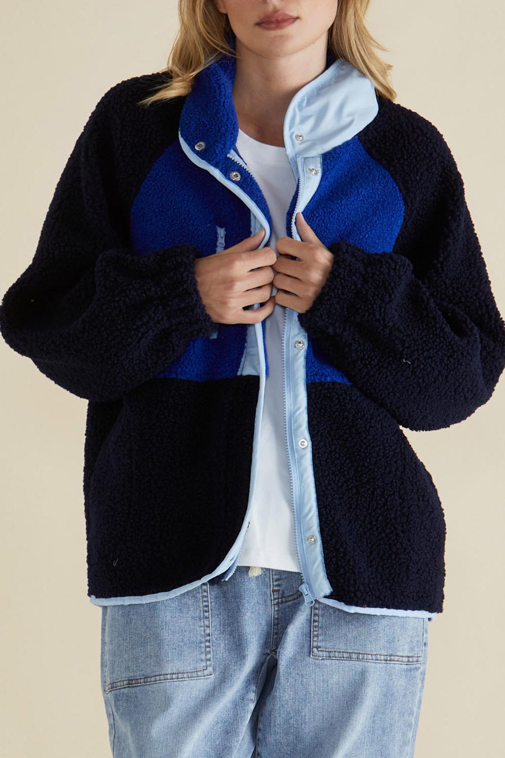 A model wearing the Franklin Fleecy Jacket in colour Blue (Blue), from the front, cropped image