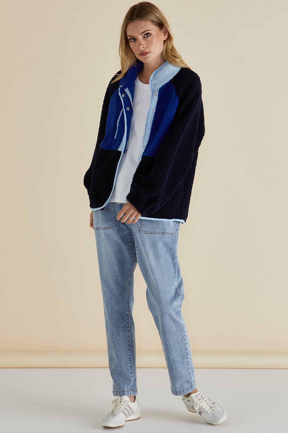 A model wearing the Franklin Fleecy Jacket in colour Blue (Blue), from the front, showing the whole outfit