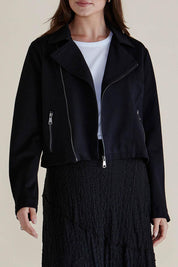 A model wearing the Aurora Ponte Biker Jacket in colour Black (Black), from the front, cropped image
