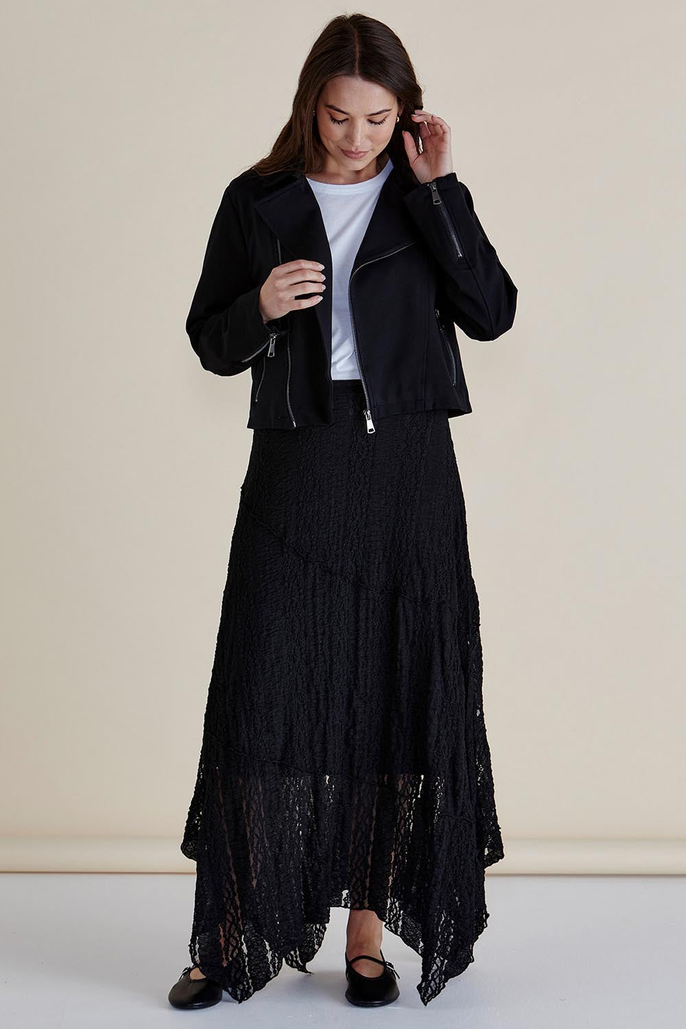A model wearing the Aurora Ponte Biker Jacket in colour Black (Black), from the front, showing the whole outfit