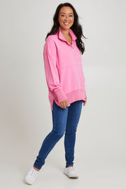 Model Katie wearing size 10 of the Sadie Sweat in colour Bpink (Pink), from the front, showing the whole outfit