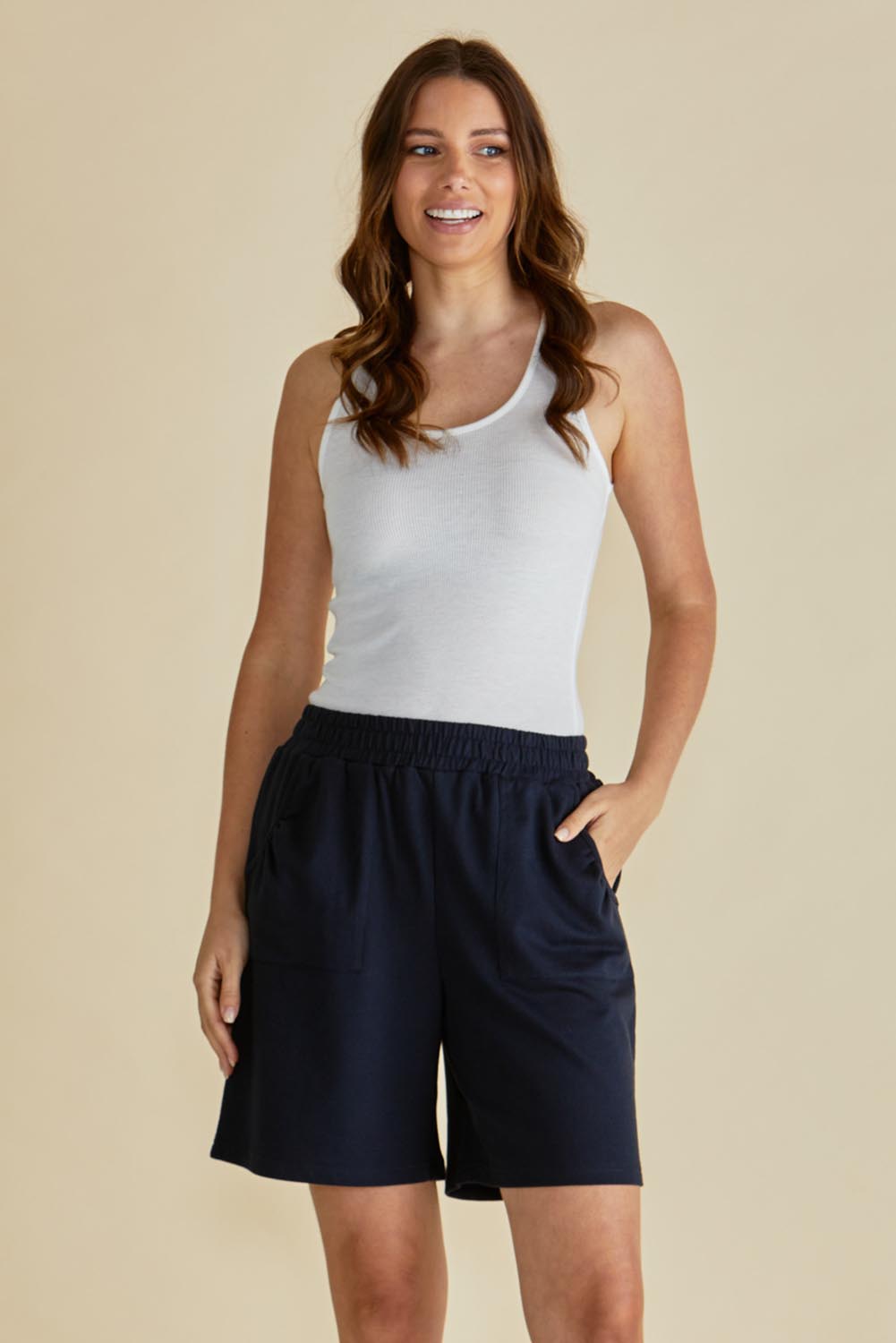 A model wearing the Harvard Cotton Short in colour Blue (Blue), from the front, cropped image