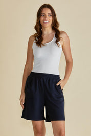 A model wearing the Harvard Cotton Short in colour Blue (Blue), from the front, cropped image
