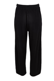 Product shot of the Evelyn Wide Leg Jogger in colour Blacktrim (Black), from the back
