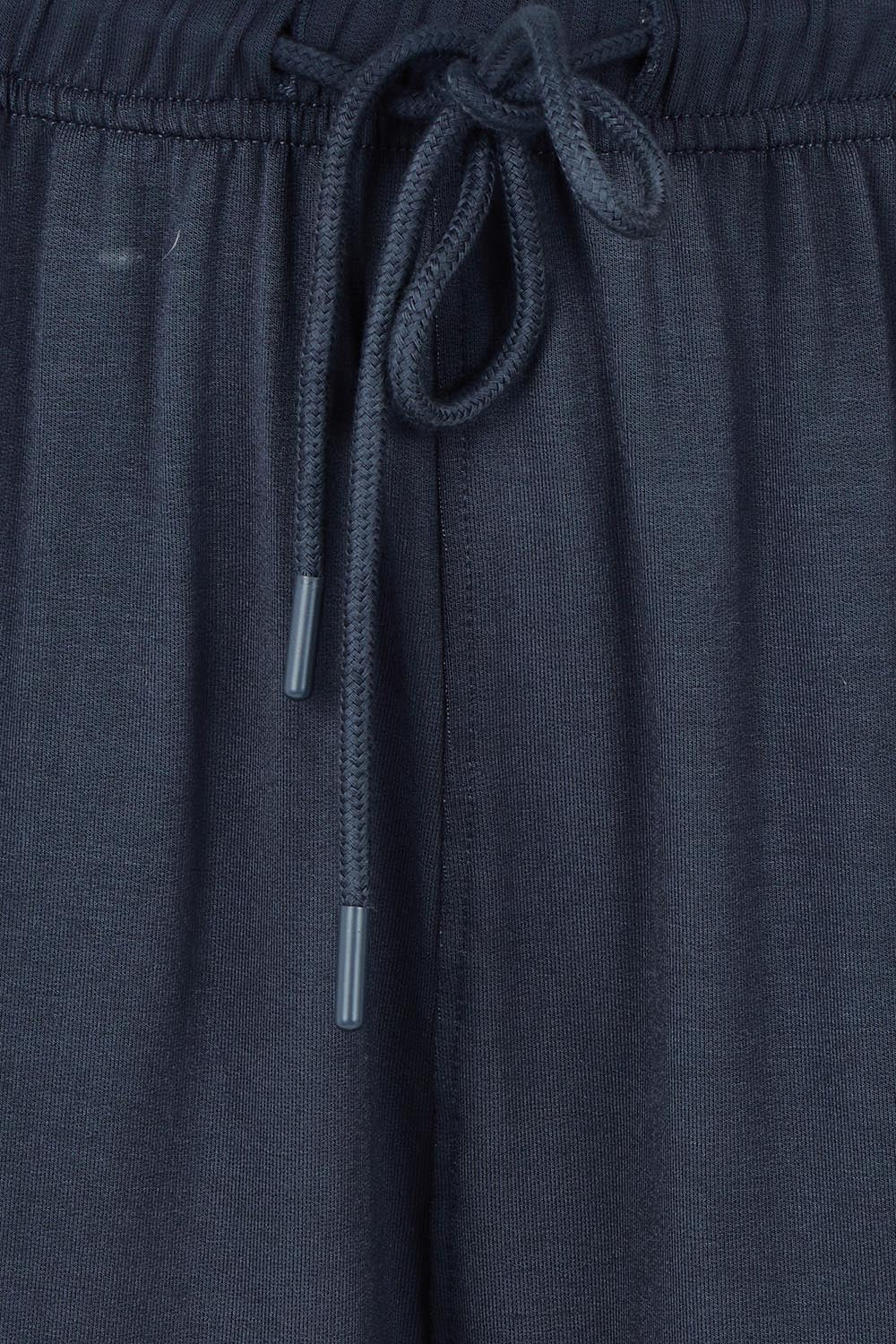 Product shot of the Evelyn Wide Leg Jogger in colour Petrol (Blue), detail