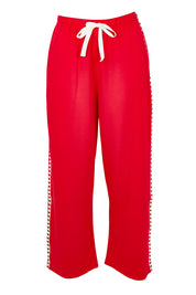Product shot of the Evelyn Wide Leg Jogger in colour Redtrim (Red), from the front