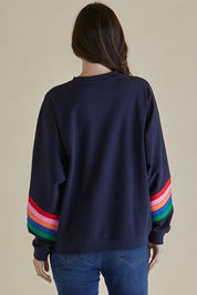 A model wearing the Davina Cotton Blend Jumper in colour Bluemulti (Blue), from the back
