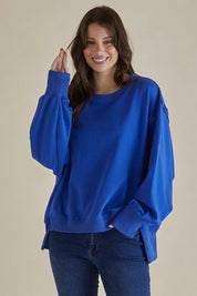 A model wearing the Mykie Cotton Blend Jumper in colour Blue (Blue), from the front, cropped image