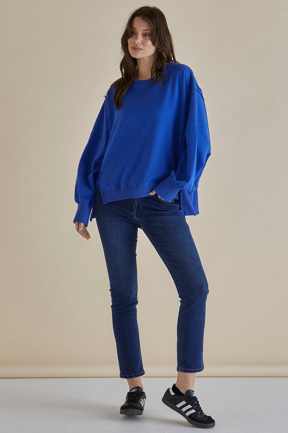 A model wearing the Mykie Cotton Blend Jumper in colour Blue (Blue), from the front, showing the whole outfit