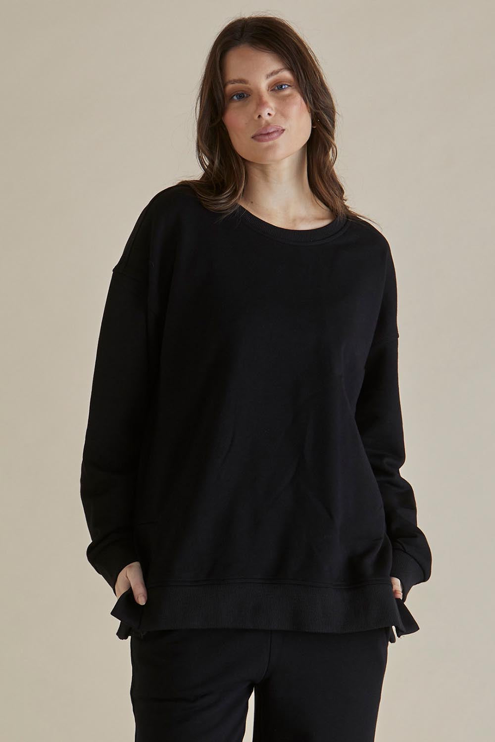 A model wearing the Easy Crew Cotton Sweat in colour Black (Black), from the front, cropped image