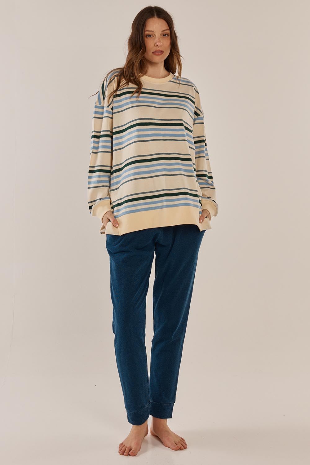 A model wearing the Easy Crew Cotton Sweat in colour Bluegreen (Blue), from the front, showing the whole outfit