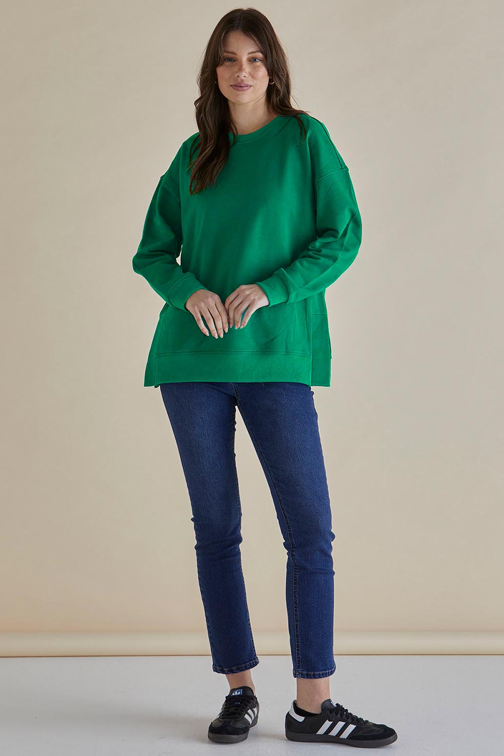 A model wearing the Easy Crew Cotton Sweat in colour Green (Green), from the front, showing the whole outfit