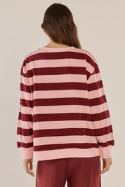 A model wearing the Stazie Sweatshirt in colour Pinkred (Pink), from the back